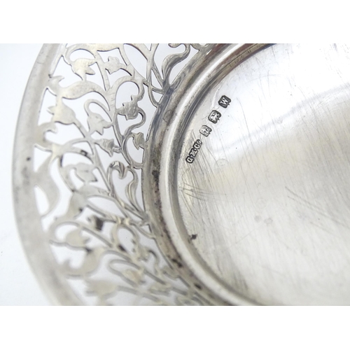 367 - A silver pin dish of circular form with open work detail, hallmarked Birmingham 1921 maker Gorham Ma... 