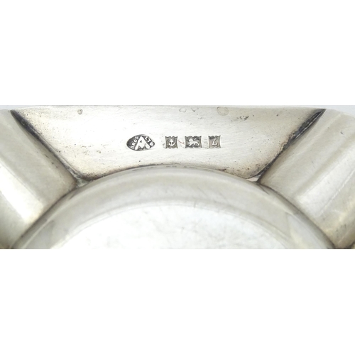 376 - A silver ash tray with engine turned decoration hallmarked Birmingham 1960, maker Adie Brothers. App... 