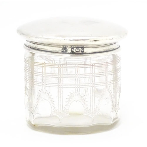 377 - A glass toilet jar with silver lid hallmarked Birmingham 1920 maker Deakin & Francis Approx. 2 1/2