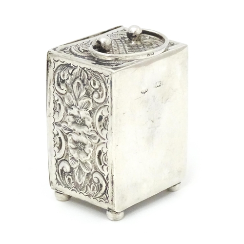 386 - A small silver clock case with embossed decoration hallmarked Birmingham 1902. Approx. 2 3/4