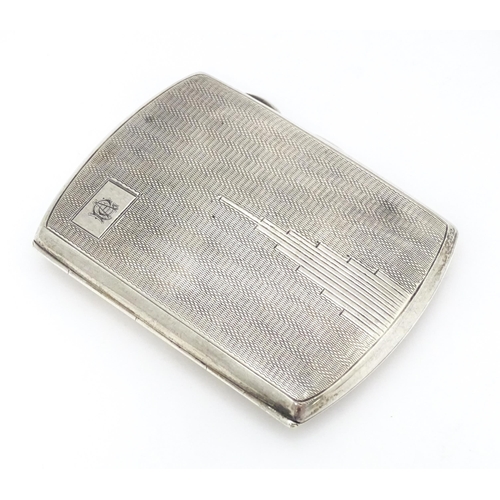 393 - A silver cigarette case with engine turned decoration hallmarked Birmingham 1934 with Jubilee mark. ... 