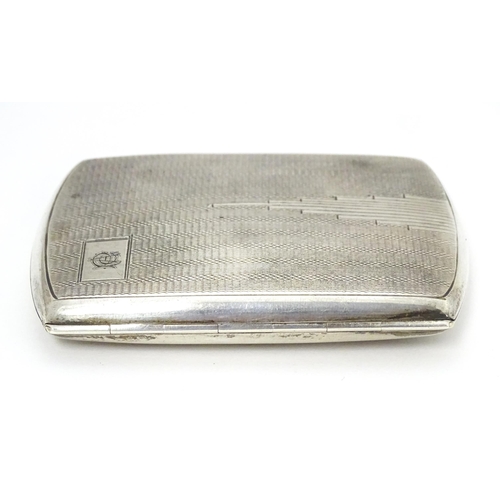 393 - A silver cigarette case with engine turned decoration hallmarked Birmingham 1934 with Jubilee mark. ... 