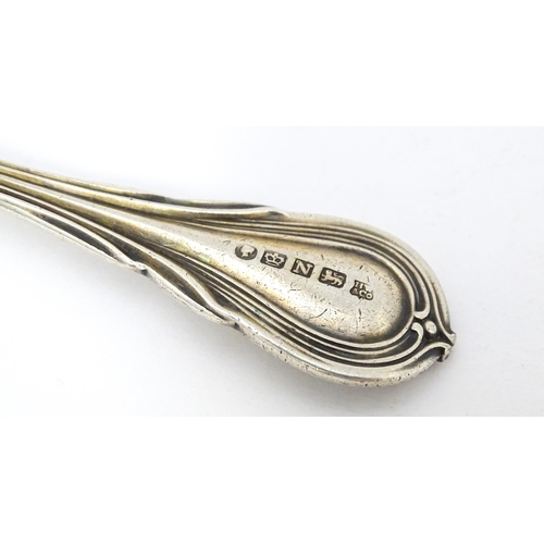 395 - Three silver spoons and pickle fork to include a Lilly pattern teaspoon hallmarked Sheffield 1846 ma... 