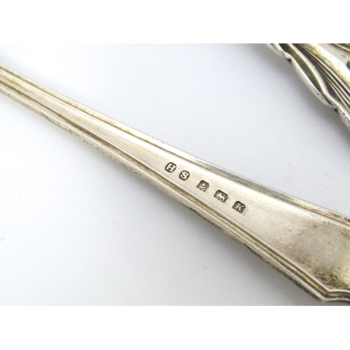 395 - Three silver spoons and pickle fork to include a Lilly pattern teaspoon hallmarked Sheffield 1846 ma... 