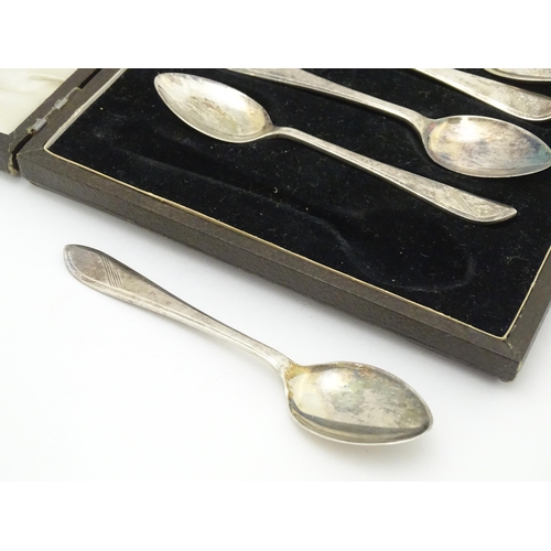 397 - A cased set of 6 Art Deco silver teaspoons hallmarked 1944 maker Walter Trickett & Co Ltd. cased. Th... 