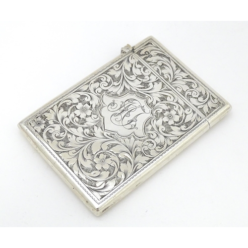 398 - A silver card case with engraved floral and acanthus decoration hallmarked Chester 1907 maker Colen ... 