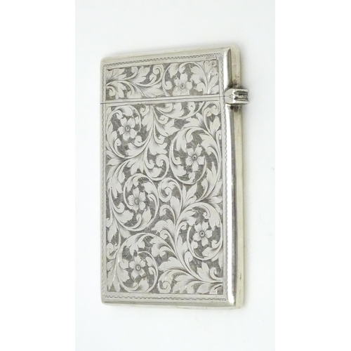 398 - A silver card case with engraved floral and acanthus decoration hallmarked Chester 1907 maker Colen ... 