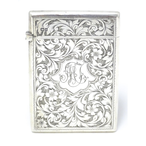 398 - A silver card case with engraved floral and acanthus decoration hallmarked Chester 1907 maker Colen ... 