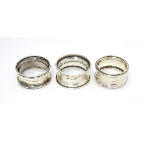 399 - Three assorted napkin rings hallmarked Birmingham 1921, 1910 and 1918 (3)