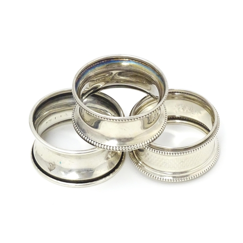 399 - Three assorted napkin rings hallmarked Birmingham 1921, 1910 and 1918 (3)