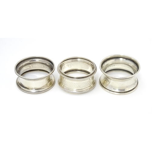 399 - Three assorted napkin rings hallmarked Birmingham 1921, 1910 and 1918 (3)