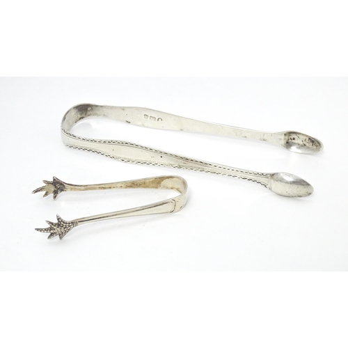 400 - Late 18thC / early 19thC Newcastle silver sugar tongs by Thomas Watson, together with small tongs wi... 