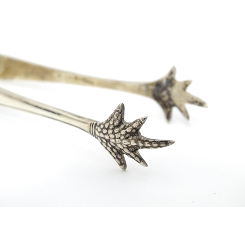 400 - Late 18thC / early 19thC Newcastle silver sugar tongs by Thomas Watson, together with small tongs wi... 