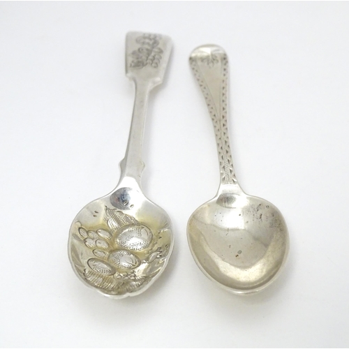 405 - Two silver teaspoons, one Victorian example with bright cut decoration hallmarked London 1877, maker... 