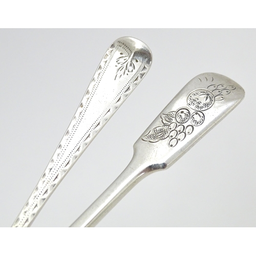 405 - Two silver teaspoons, one Victorian example with bright cut decoration hallmarked London 1877, maker... 