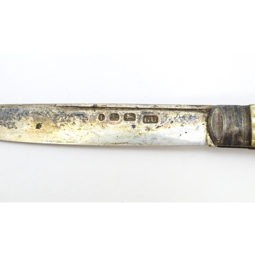 407 - A Victorian silver folding fruit knife with mother of pearl handle. Hallmarked Birmingham 1861 maker... 