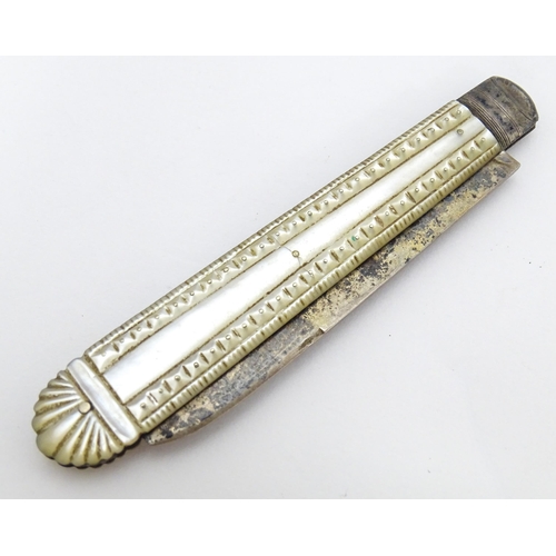 407 - A Victorian silver folding fruit knife with mother of pearl handle. Hallmarked Birmingham 1861 maker... 