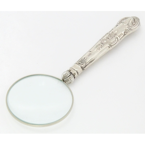 409 - A silver handled magnifying glass.  Approx. 6 1/4