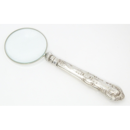 409 - A silver handled magnifying glass.  Approx. 6 1/4