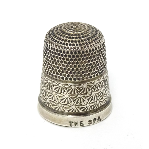 410 - A silver thimble titled ' The spa' and hallmarked Birmingham 1927 maker Henry Griffith & Sons Ltd