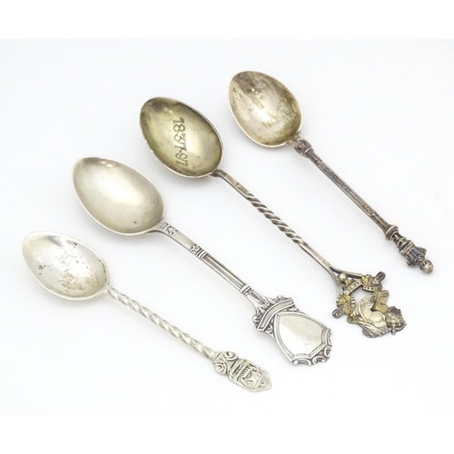 412 - Four assorted silver souvenir / commemorative teaspoons to include one surmounted by bust of William... 