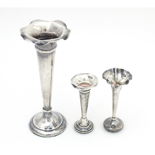 415 - Three various silver bud vases, one hallmarked Sheffield 1905 maker James Deakin & Sons, one hallmar... 