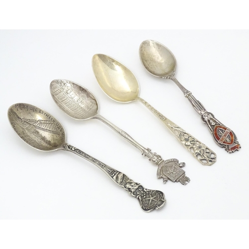 416 - Four silver souvenir spoons to include one hallmarked Birmingham 1932  titled St Dunstan's to handle... 