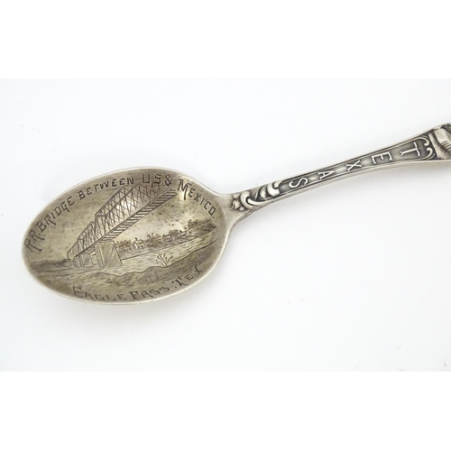 416 - Four silver souvenir spoons to include one hallmarked Birmingham 1932  titled St Dunstan's to handle... 