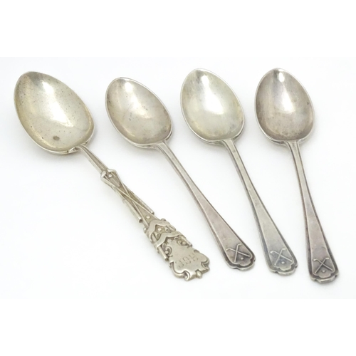 417 - Three silver teaspoons with crossed golf club decoration to handles hallmarked Sheffield 1933 maker ... 