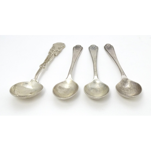 417 - Three silver teaspoons with crossed golf club decoration to handles hallmarked Sheffield 1933 maker ... 