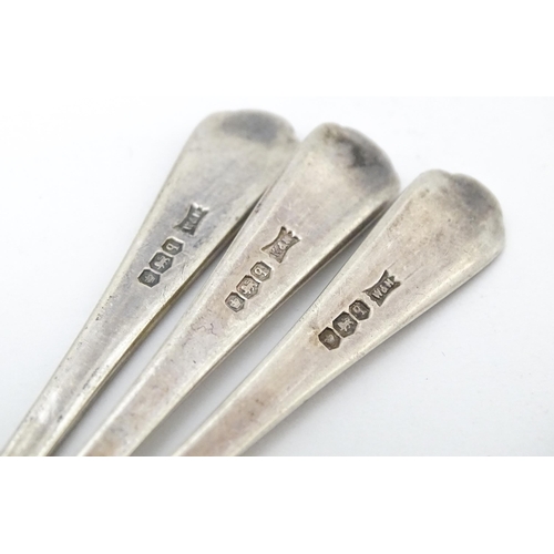 417 - Three silver teaspoons with crossed golf club decoration to handles hallmarked Sheffield 1933 maker ... 