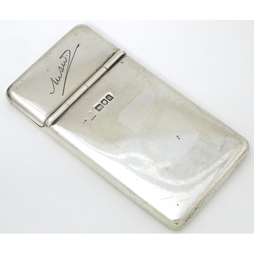 432 - A silver card case with sprung lid and gilded interior. Hallmarked London 1902 maker Samson Mordan &... 