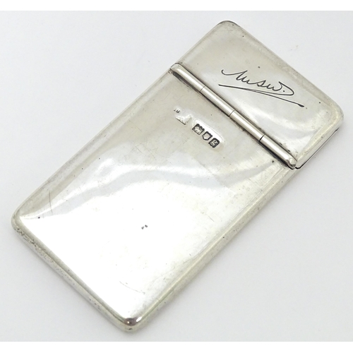432 - A silver card case with sprung lid and gilded interior. Hallmarked London 1902 maker Samson Mordan &... 
