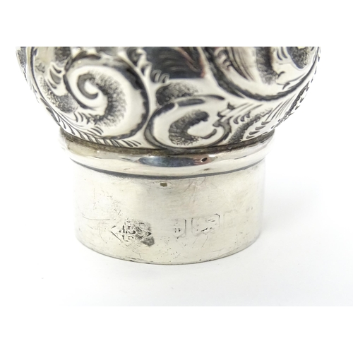 436 - An early 20thC cut glass scent / perfume bottle with silver top . 4