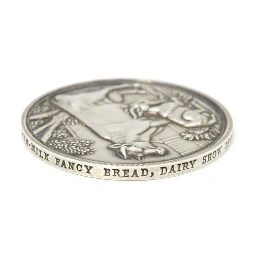 437 - Farming interest : A silver medallion for the ' British farmers' Association' Dairy Show 1906 Awarde... 