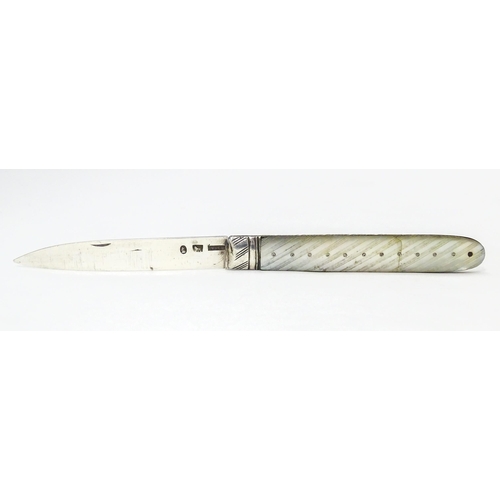 447 - A 19thC silver folding fruit knife with mother of pearl handle, maker W&Co. Approx. 5 1/2