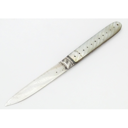 447 - A 19thC silver folding fruit knife with mother of pearl handle, maker W&Co. Approx. 5 1/2