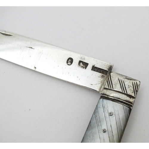 447 - A 19thC silver folding fruit knife with mother of pearl handle, maker W&Co. Approx. 5 1/2