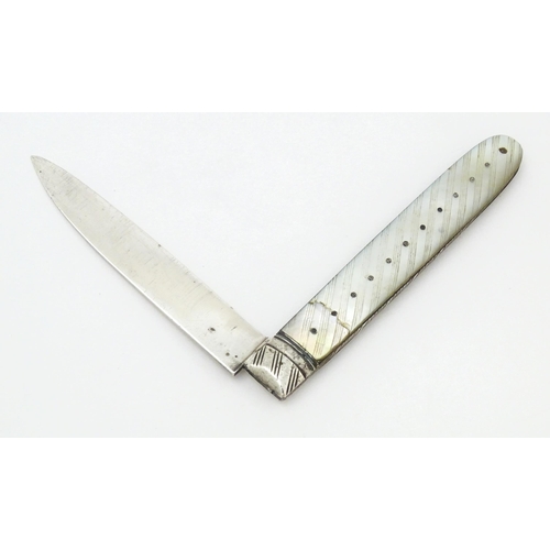 447 - A 19thC silver folding fruit knife with mother of pearl handle, maker W&Co. Approx. 5 1/2