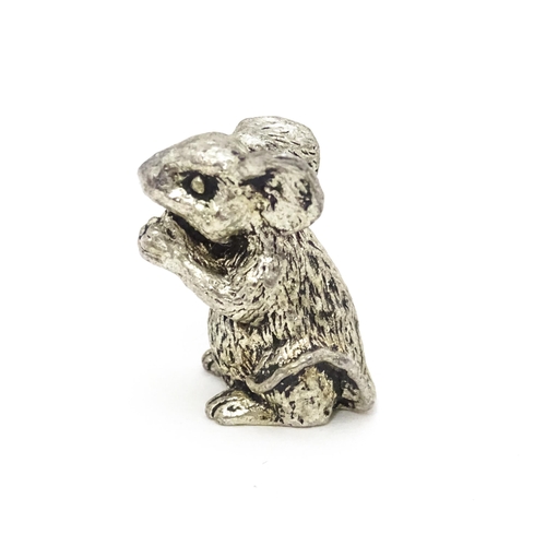 478 - A silver plate model of a seated mouse. Approx. 1