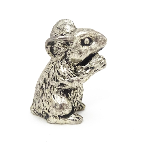 478 - A silver plate model of a seated mouse. Approx. 1