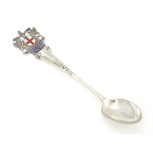 482 - A silver spoon with enamel crest to handle, hallmarked Sheffield 1907, J & J Maxfield Ltd Approx. 5