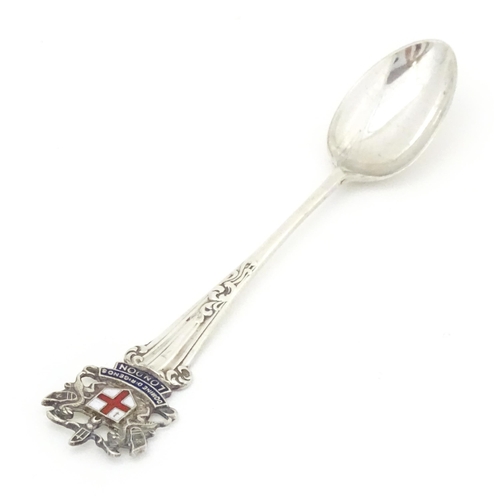 482 - A silver spoon with enamel crest to handle, hallmarked Sheffield 1907, J & J Maxfield Ltd Approx. 5