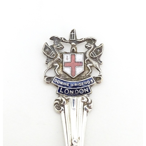 482 - A silver spoon with enamel crest to handle, hallmarked Sheffield 1907, J & J Maxfield Ltd Approx. 5