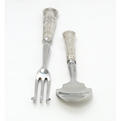 487 - A silver Kings pattern handled pickle fork. Together with a silver Kings pattern handled preserve sp... 