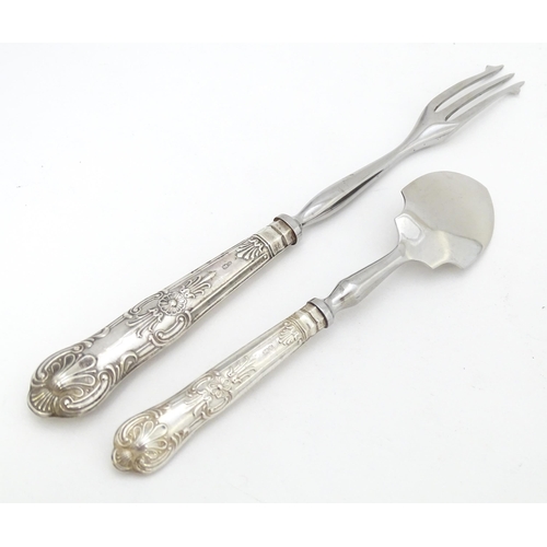 487 - A silver Kings pattern handled pickle fork. Together with a silver Kings pattern handled preserve sp... 