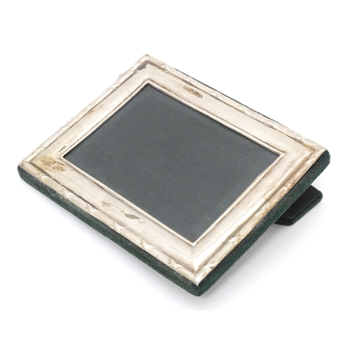 495 - A photograph frame with easel back and silver surround hallmarked Birmingham 1998 maker Ray Hall. Ap... 