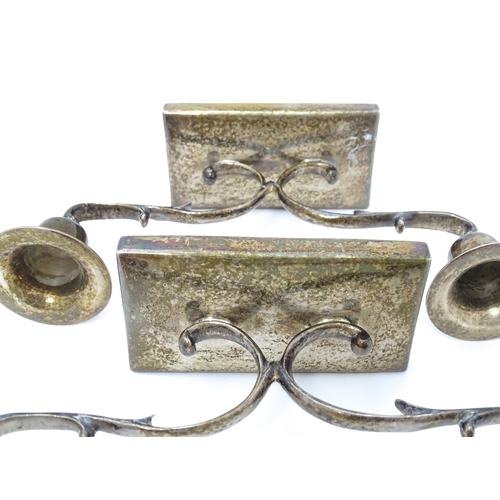 506 - A pair of Mexican silver candlesticks of twin branch form. Approx. 8 1/2