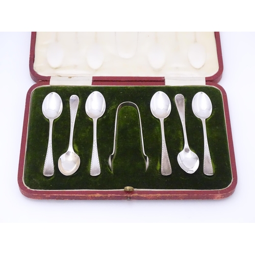 544 - A set of six silver teaspoons and sugar tongs en suite hallmarked Sheffield 1910, maker James Dixon ... 