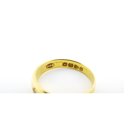 583 - A Victorian 18ct gold ring set with three diamonds. Hallmarked Chester 1897. Ring size approx. M